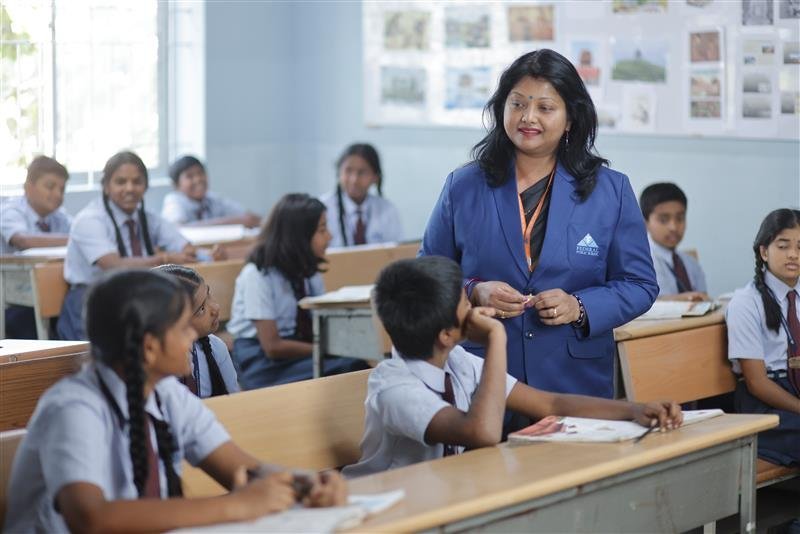 Students learning with teacher in classroom at Federal Public School – One of the best ICSE schools in Bangalore